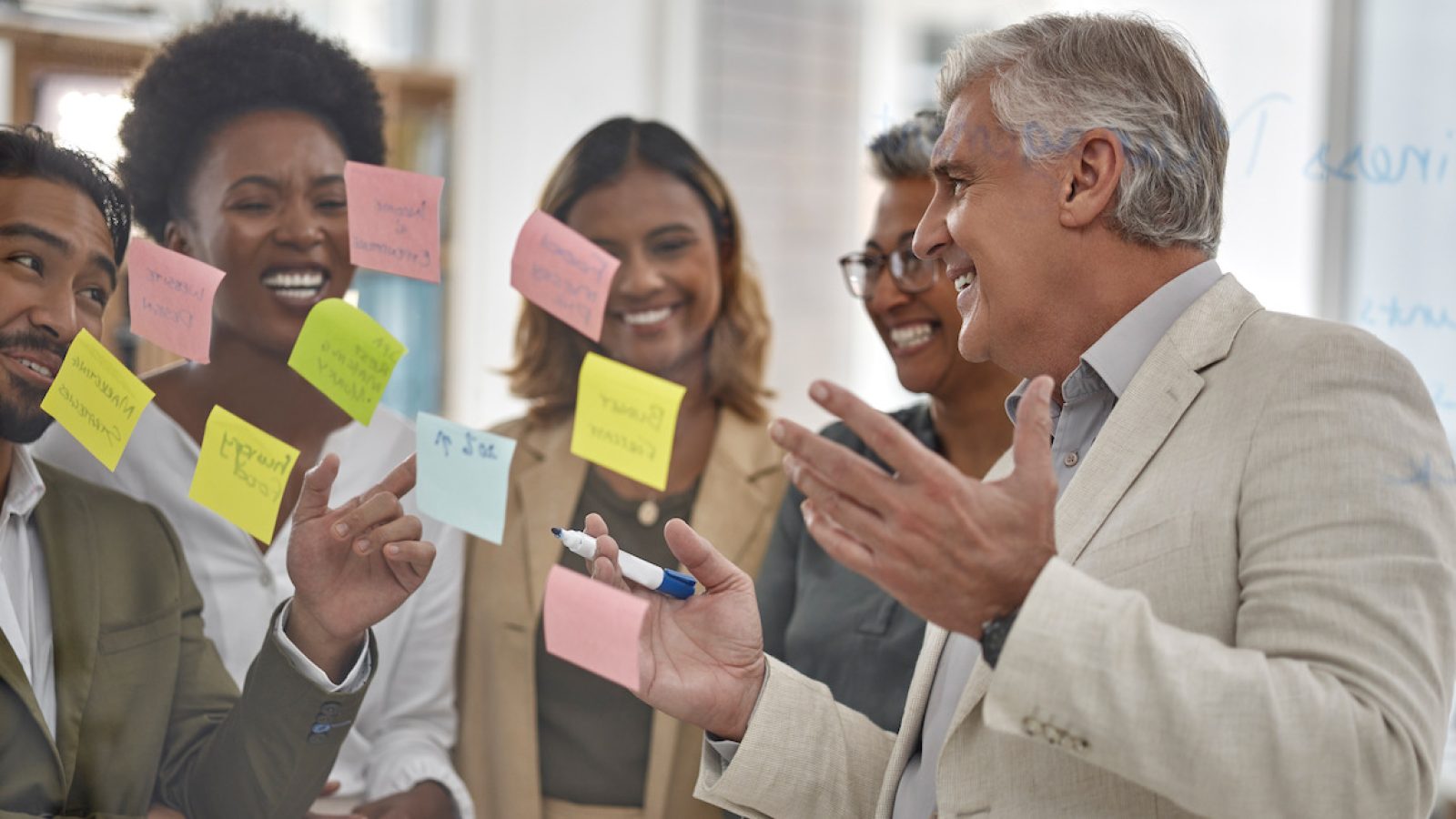 Meeting, planning and glass with a senior man leading a presentation in a boardroom for company str.